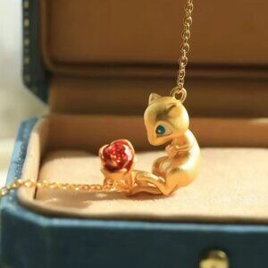 Pokémon Mew Necklace with a Gold Matte Finish